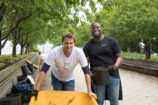 Wheel Barrel and two volunteers