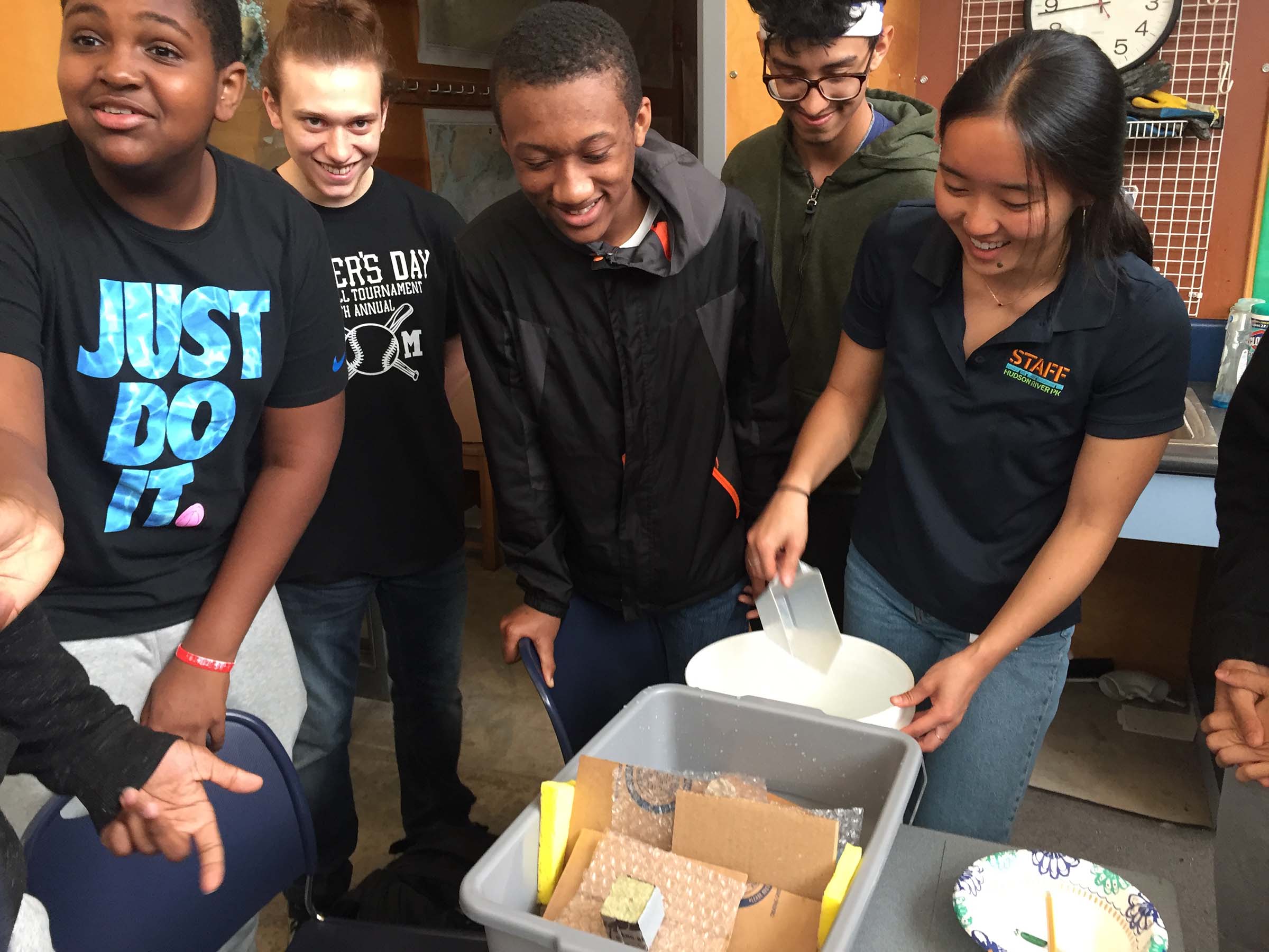 A group of students enjoy learning about the Hudson River