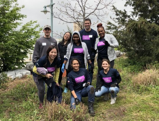 Pink logos on jackets of the volunteers