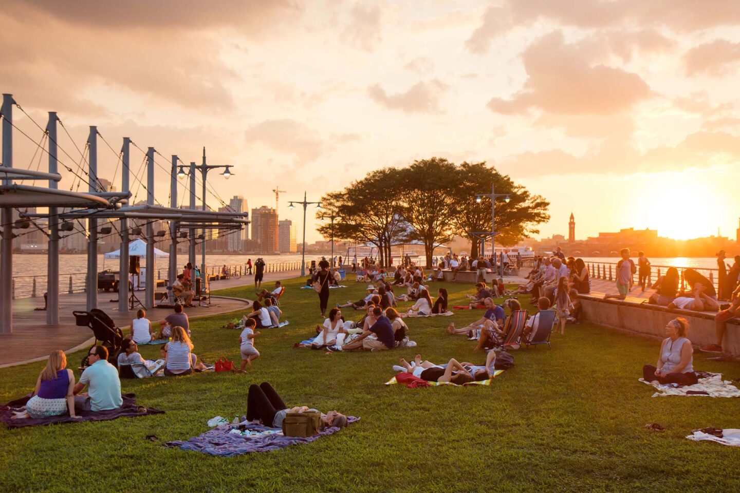 Sunbathers enjoy the sunset at Pier 45