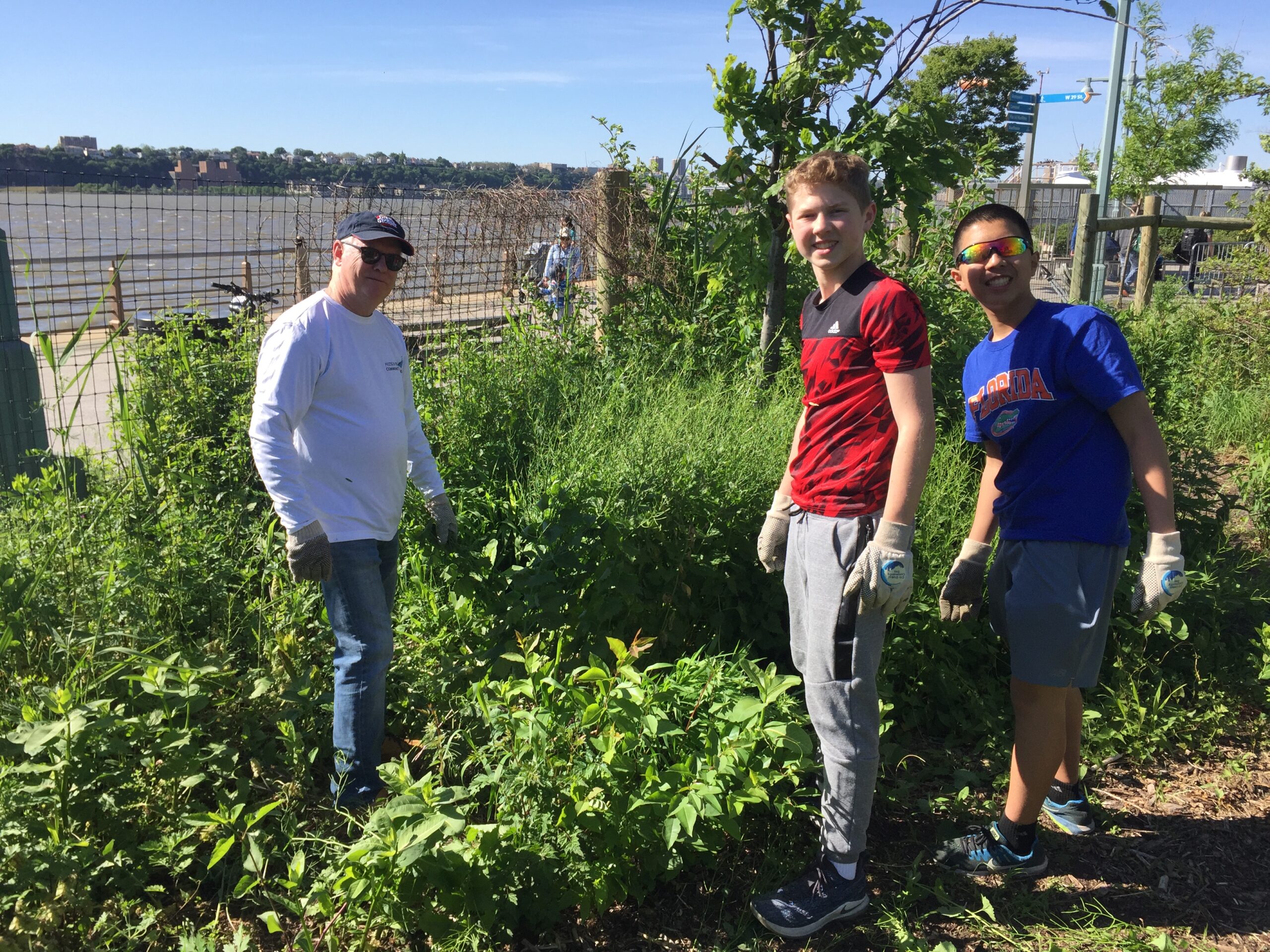 Volunteer students in the habitat garden