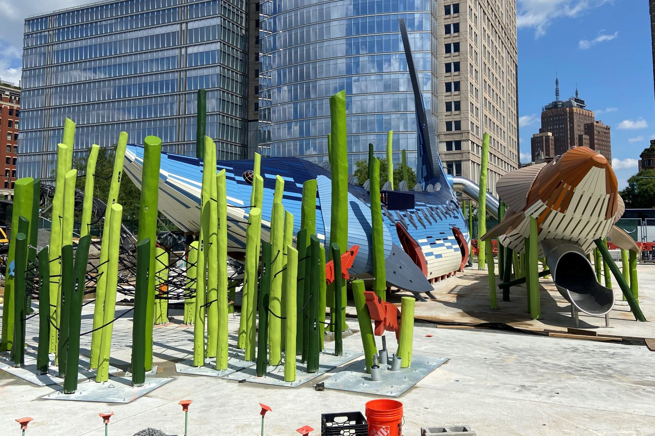 Slides designed to look like sturgeon under construction at the Pier 26 Science Play Area